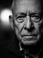 Expressions of wisdom and experience captured in a soulful portrait of an elderly man photo