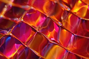 Colorful reflections create a vibrant pattern on a translucent surface under light photo