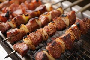 Grilling skewers of meat and vegetables on a barbecue at a summer gathering photo