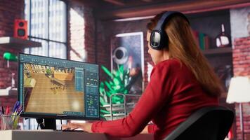 Woman at home creating a 3D render of an apartment interior layout, utilizing architectural software. Developer uses digital tools to decorate detailed home design, placing assets. Camera A. photo