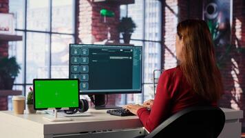 Woman interacting with intelligent AI chatbot next to mockup display, using innovative system. Machine learning enhances efficiency and communication through advanced algorithms. Camera A. photo