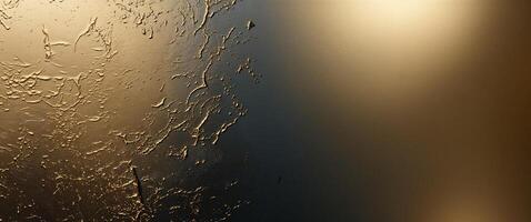 A close up of a window with a gold paint photo