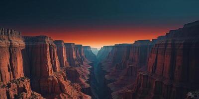 A canyon at sunset with a view of the mountains photo