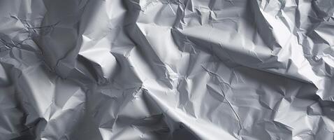 Highly Textured Crumpled Gray Paper Background. photo