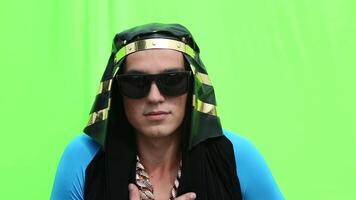 Guy in Egyptian Costume on Green Background video