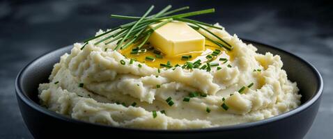 Mashed potatoes with butter and herbs photo