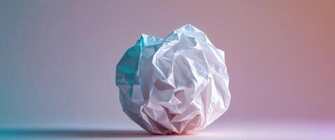 Crumpled White Paper Ball on Bright Background for Creative Use. photo
