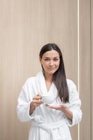 Relaxing moment with a warm beverage in a serene setting photo