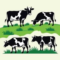 four cows grazing on a green field vector