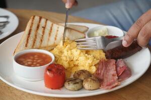 Delicious breakfast served with scrambled eggs and toast photo