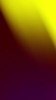a yellow and red background with a blurred image video