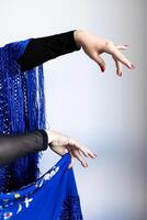 Graceful flamenco dance movements with blue shawl and elegance photo