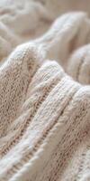 Ultra detailed close up of knitting stitches texture for design and craft inspiration photo