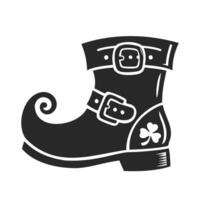 Silhouette of a leprechaun shoe with buckles and a shamrock, symbolizing Irish folklore and luck. vector