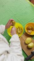 Take Care When Peeling Potatoes From Their Skins Before Cooking them In The Oven Vertical video