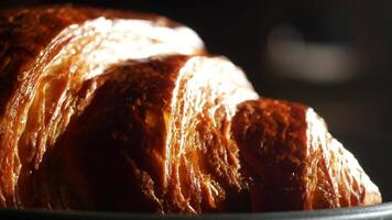 Freshly baked croissant with golden crust at local bakery video