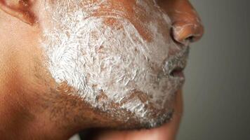 Man applying face wash on face video
