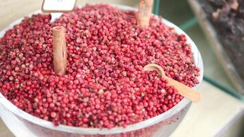 Exploring vibrant spices and herbs at a local market in autumn video