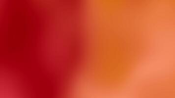 A red and orange blurred background with a blurred image video