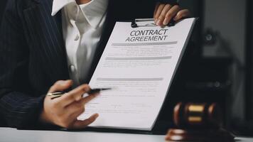 Contract assignment in a business meeting video