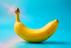 A banana is shown on a blue background photo