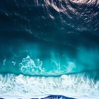 An aerial view of the ocean and waves photo