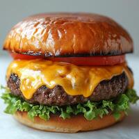 Juicy Cheeseburger with Melted Cheddar and Lettuce photo