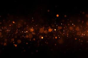 Golden glitter particles floating in the air, bokeh effect, dark background, warm light, magical atmosphere, festive mood, abstract design, elegant, luxurious, dreamy photo