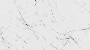 Black and white grunge texture background with distressed scratches, grainy noise and dust particles. This gritty textured animation is full HD and a seamless loop. video