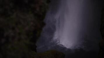 Icelandic waterfall Skogafoss viewed from below in mist video