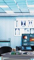 Vertical Old specialist meeting with a woman patient to discuss results in a cabinet, using advanced diagnostic equipment to interpret x ray scans and results, professional healthcare approach. Camera A. video