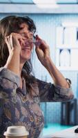 Vertical Medical professional examines patient reaction to light for concussion assessment, checking for dizziness, sensitivity and balance issues. Physician does a neurological checkup. Camera A. video