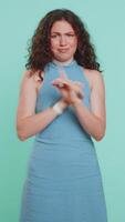 Woman say No hold palm folded crossed hands in stop gesture warning of finish prohibited access video