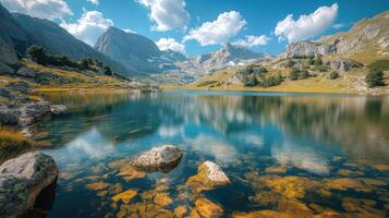 Exploring a Tranquil Mountain Lake Surrounded by Stunning Peaks and Vibrant Reflections photo