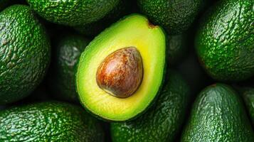 Close up View of Ripe, Green Avocado Showcasing a Smooth Skin and Rich Interior Color photo