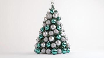 Christmas Tree Crafted From Green and Silver Ornaments Set Against a White Background for Festive Decor photo