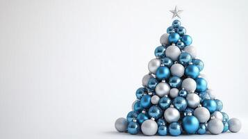 Beautiful Blue and Silver Christmas Tree Created With Ornaments on a White Background for Festive Decor photo