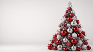 Beautiful Christmas Tree Made From Red and Silver Ornaments on a Bright White Background photo