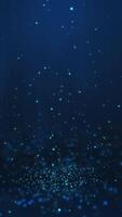 Blue particles twirling on the ground and flying in the air with light rays at the top center, vertical composition. Standard speed. Loop animation footage for graphic design. video