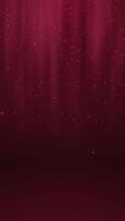 Red glowing circles particles falling in the air and light rays at the top middle of a cyc wall background, vertical composition. Loop animation footage for graphic design. video