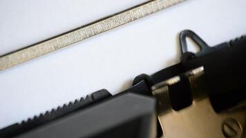 Typing the expression Press Release with an old manual typewriter video