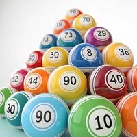 A pyramid of bingo balls with numbers on them photo