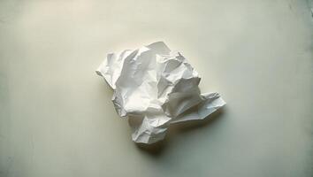 a white piece of paper is sitting on top of a table photo