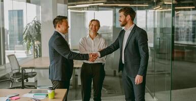 A Significant Business Meeting Featuring a Handshake in a Modern Office Environment photo