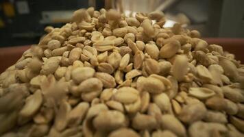 Roasting peanuts. Sorting operations in nuts factory. Roasted peanut packaging production line 6 video