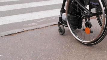 A person with a disability moves along the street in a wheelchair, the border prevents the movement of the wheelchair 3 video