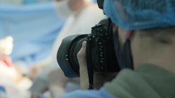Breast augmentation under the guidance surgeons team in surgical operating room, blurred background 2 video