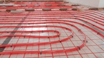 Installing underfloor heating pipes for water heating. Heating systems. Pipes for a heat-insulated floor. 36 video