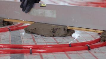Installing underfloor heating pipes for water heating. Heating systems. Pipes for a heat-insulated floor. 24 video