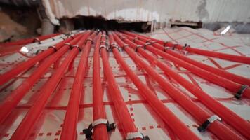 Installing underfloor heating pipes for water heating. Heating systems. Pipes for a heat-insulated floor. 10 video